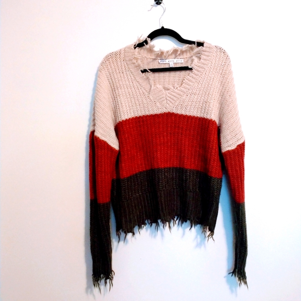 Hyfve distressed color blocked knit sweater. Raw hem and neckline size large. Mi